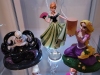 Anna, Rapunzel, and Ursula statues